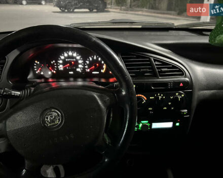 Зелений Деу Ланос, об'ємом двигуна 2 л та пробігом 245 тис. км за 2300 $, фото 21 на Automoto.ua