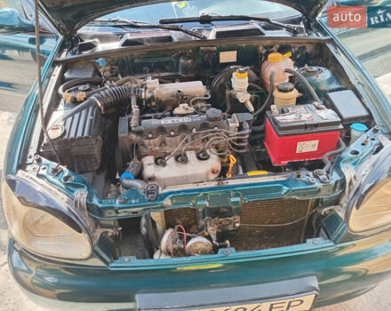 Зеленый Дэу Ланос, объемом двигателя 1.5 л и пробегом 254 тыс. км за 3200 $, фото 5 на Automoto.ua