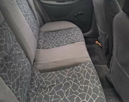 Зеленый Дэу Ланос, объемом двигателя 1.5 л и пробегом 255 тыс. км за 2100 $, фото 3 на Automoto.ua