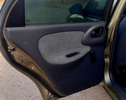 Зеленый Дэу Ланос, объемом двигателя 1.5 л и пробегом 130 тыс. км за 2000 $, фото 3 на Automoto.ua