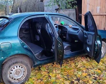 Зеленый Дэу Ланос, объемом двигателя 1.5 л и пробегом 120 тыс. км за 3000 $, фото 13 на Automoto.ua