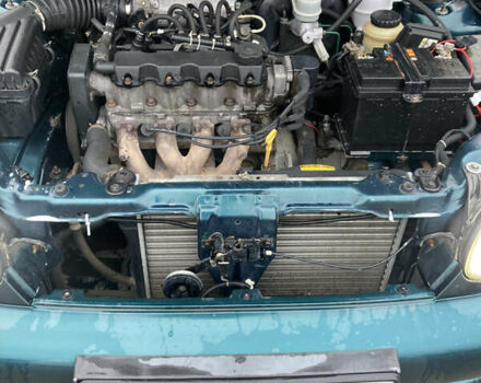 Зеленый Дэу Ланос, объемом двигателя 1.5 л и пробегом 270 тыс. км за 2000 $, фото 12 на Automoto.ua