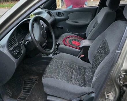 Зеленый Дэу Ланос, объемом двигателя 1.5 л и пробегом 332 тыс. км за 1650 $, фото 2 на Automoto.ua