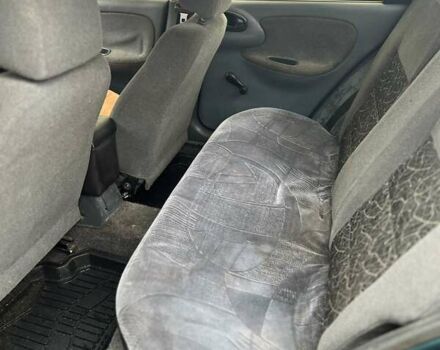 Зеленый Дэу Ланос, объемом двигателя 1.35 л и пробегом 171 тыс. км за 950 $, фото 5 на Automoto.ua