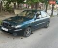 Зеленый Дэу Ланос, объемом двигателя 1.6 л и пробегом 300 тыс. км за 2000 $, фото 1 на Automoto.ua
