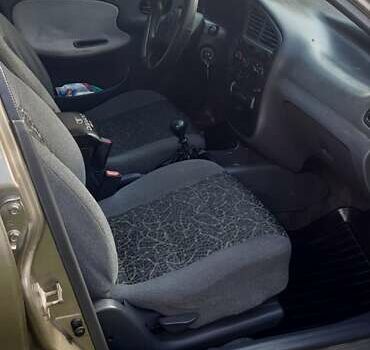 Зеленый Дэу Ланос, объемом двигателя 1.5 л и пробегом 205 тыс. км за 2500 $, фото 5 на Automoto.ua