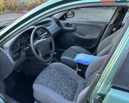 Зеленый Дэу Ланос, объемом двигателя 1.5 л и пробегом 148 тыс. км за 2222 $, фото 15 на Automoto.ua