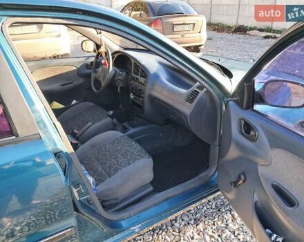 Зеленый Дэу Ланос, объемом двигателя 1.3 л и пробегом 146 тыс. км за 2100 $, фото 3 на Automoto.ua