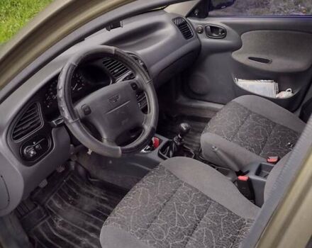 Зеленый Дэу Ланос, объемом двигателя 1.6 л и пробегом 109 тыс. км за 3400 $, фото 8 на Automoto.ua