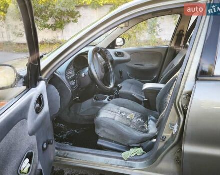 Зеленый Дэу Ланос, объемом двигателя 1.6 л и пробегом 375 тыс. км за 1800 $, фото 3 на Automoto.ua