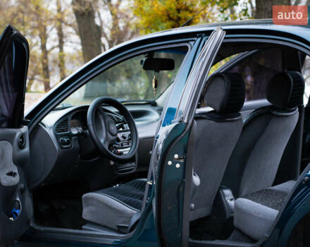 Зеленый Дэу Ланос, объемом двигателя 1.5 л и пробегом 166 тыс. км за 3500 $, фото 3 на Automoto.ua