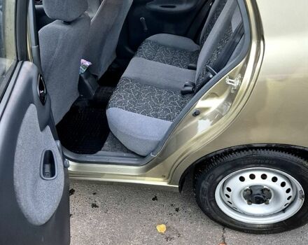 Зеленый Дэу Ланос, объемом двигателя 1.4 л и пробегом 47 тыс. км за 2800 $, фото 7 на Automoto.ua