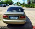Зеленый Дэу Ланос, объемом двигателя 1.4 л и пробегом 400 тыс. км за 2000 $, фото 2 на Automoto.ua