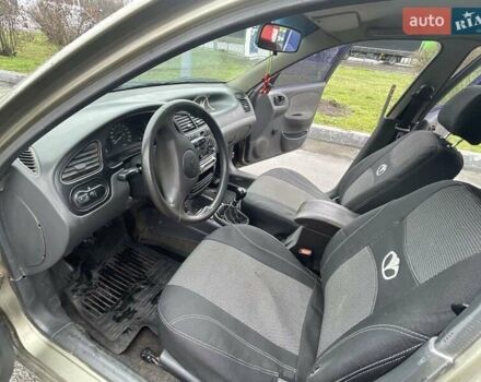 Зеленый Дэу Ланос, объемом двигателя 1.4 л и пробегом 207 тыс. км за 2200 $, фото 3 на Automoto.ua