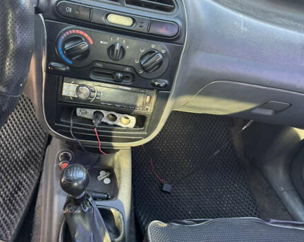 Зеленый Дэу Ланос, объемом двигателя 1.5 л и пробегом 170 тыс. км за 1900 $, фото 10 на Automoto.ua