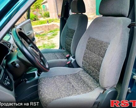 Зеленый Дэу Ланос, объемом двигателя 1.4 л и пробегом 115 тыс. км за 2100 $, фото 2 на Automoto.ua