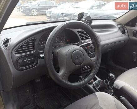 Зеленый Дэу Ланос, объемом двигателя 1.5 л и пробегом 207 тыс. км за 2450 $, фото 4 на Automoto.ua