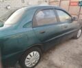 Зеленый Дэу Ланос, объемом двигателя 1.5 л и пробегом 400 тыс. км за 1850 $, фото 3 на Automoto.ua