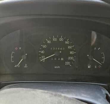 Зеленый Дэу Ланос, объемом двигателя 1.39 л и пробегом 233 тыс. км за 1650 $, фото 4 на Automoto.ua