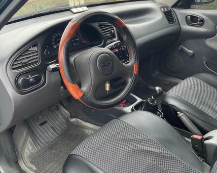 Зелений Деу Ланос, об'ємом двигуна 1.5 л та пробігом 93 тис. км за 2300 $, фото 4 на Automoto.ua