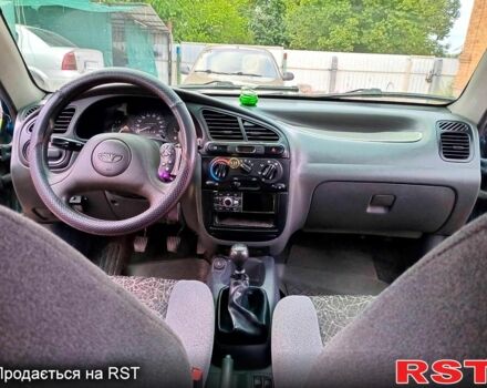 Зеленый Дэу Ланос, объемом двигателя 1.4 л и пробегом 115 тыс. км за 2100 $, фото 3 на Automoto.ua