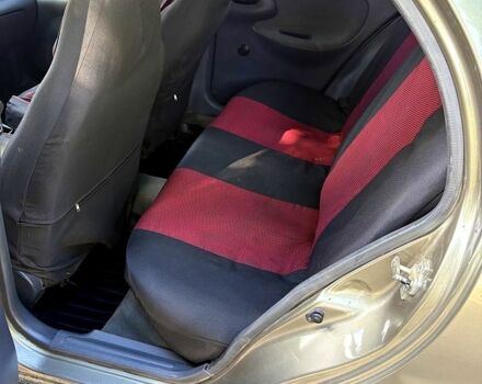 Зеленый Дэу Ланос, объемом двигателя 1.4 л и пробегом 136 тыс. км за 1400 $, фото 3 на Automoto.ua