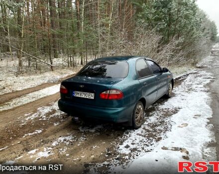 Зеленый Дэу Ланос, объемом двигателя 1.4 л и пробегом 280 тыс. км за 2000 $, фото 2 на Automoto.ua
