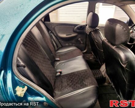 Зеленый Дэу Ланос, объемом двигателя 1.5 л и пробегом 283 тыс. км за 2200 $, фото 8 на Automoto.ua