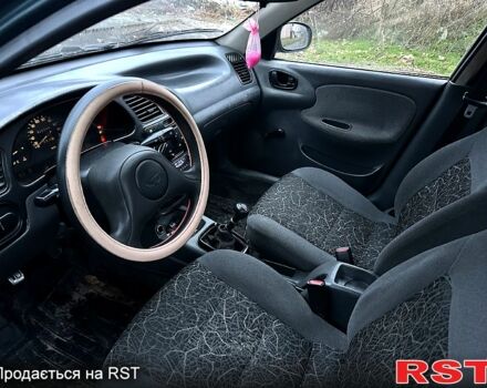 Зеленый Дэу Ланос, объемом двигателя 1.4 л и пробегом 190 тыс. км за 1899 $, фото 7 на Automoto.ua