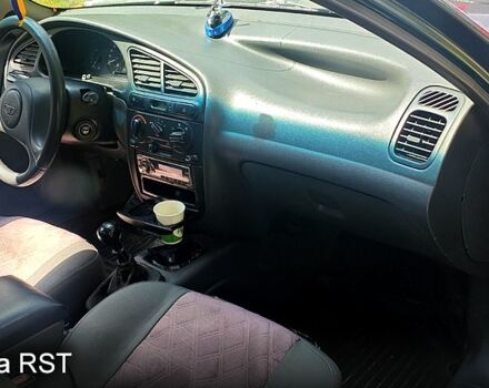 Зеленый Дэу Ланос, объемом двигателя 1.6 л и пробегом 303 тыс. км за 2000 $, фото 3 на Automoto.ua