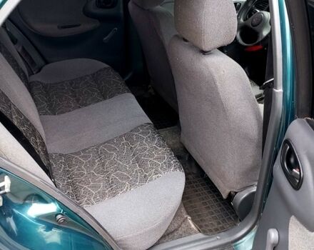 Зеленый Дэу Ланос, объемом двигателя 1.5 л и пробегом 210 тыс. км за 2350 $, фото 4 на Automoto.ua