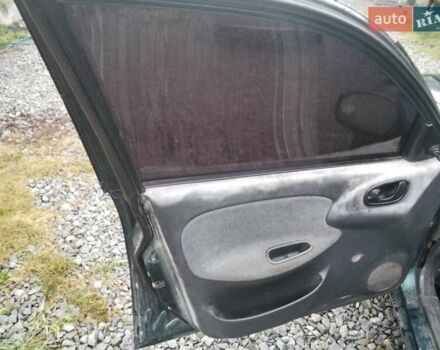 Зелений Деу Ланос, об'ємом двигуна 1.4 л та пробігом 188 тис. км за 1400 $, фото 21 на Automoto.ua