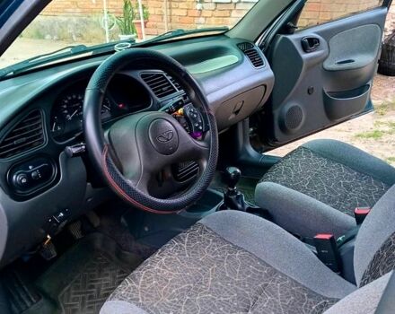 Зеленый Дэу Ланос, объемом двигателя 1.4 л и пробегом 115 тыс. км за 2100 $, фото 1 на Automoto.ua