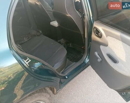 Деу Ланос 2007 у Верхнеднепровске на Automoto.ua Зелений Деу Ланос, об'ємом двигуна 1.4 л та пробігом 155 тис. км за 2999 $, фото 9 на Automoto.ua