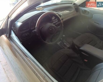 Зеленый Дэу Ланос, объемом двигателя 1.5 л и пробегом 280 тыс. км за 2100 $, фото 4 на Automoto.ua