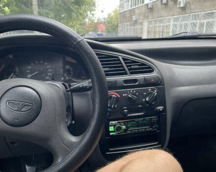 Зеленый Дэу Ланос, объемом двигателя 1.5 л и пробегом 290 тыс. км за 2000 $, фото 3 на Automoto.ua