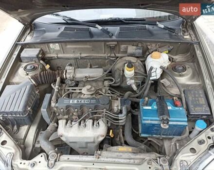 Зеленый Дэу Ланос, объемом двигателя 1.5 л и пробегом 207 тыс. км за 2450 $, фото 11 на Automoto.ua