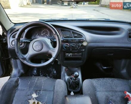 Зеленый Дэу Ланос, объемом двигателя 1.6 л и пробегом 375 тыс. км за 1800 $, фото 2 на Automoto.ua