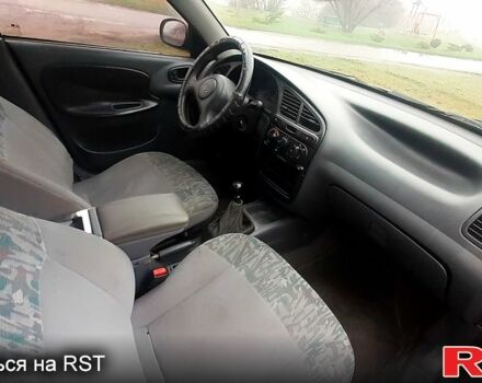 Зеленый Дэу Ланос, объемом двигателя 1.3 л и пробегом 350 тыс. км за 1200 $, фото 6 на Automoto.ua