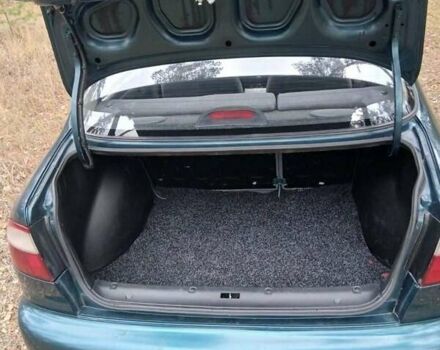 Зеленый Дэу Ланос, объемом двигателя 1.4 л и пробегом 114 тыс. км за 2200 $, фото 6 на Automoto.ua