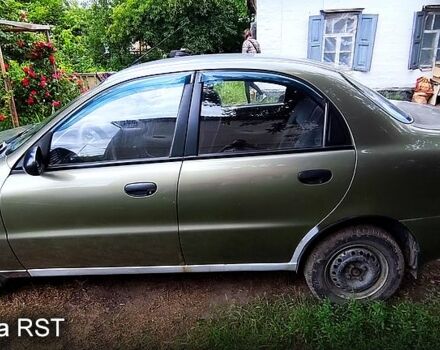 Зеленый Дэу Ланос, объемом двигателя 1.4 л и пробегом 366 тыс. км за 2100 $, фото 2 на Automoto.ua
