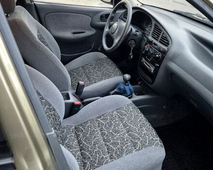 Зеленый Дэу Ланос, объемом двигателя 1.4 л и пробегом 47 тыс. км за 2800 $, фото 6 на Automoto.ua