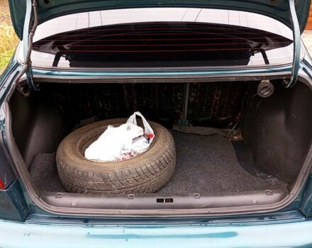 Зеленый Дэу Ланос, объемом двигателя 1.5 л и пробегом 210 тыс. км за 2350 $, фото 2 на Automoto.ua