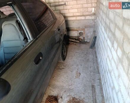 Зеленый Дэу Ланос, объемом двигателя 1.5 л и пробегом 280 тыс. км за 2100 $, фото 5 на Automoto.ua