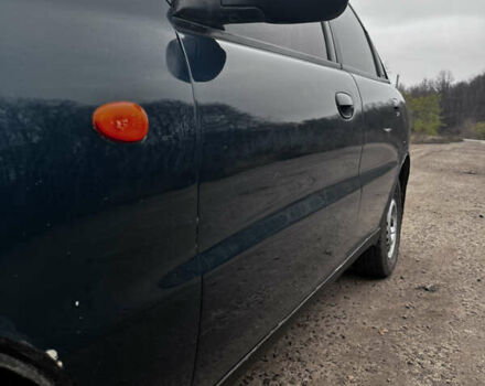 Зеленый Дэу Ланос, объемом двигателя 1.5 л и пробегом 251 тыс. км за 2800 $, фото 8 на Automoto.ua