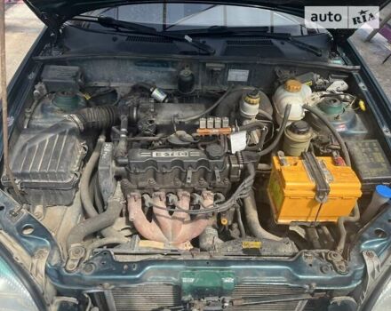 Зелений Деу Ланос, об'ємом двигуна 1.5 л та пробігом 260 тис. км за 2500 $, фото 29 на Automoto.ua