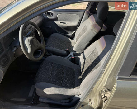 Зелений Деу Ланос, об'ємом двигуна 1.4 л та пробігом 555 тис. км за 875 $, фото 11 на Automoto.ua