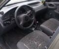 Зеленый Дэу Ланос, объемом двигателя 1.5 л и пробегом 238 тыс. км за 750 $, фото 6 на Automoto.ua