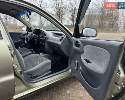 Зелений Деу Ланос, об'ємом двигуна 1.39 л та пробігом 196 тис. км за 1100 $, фото 7 на Automoto.ua