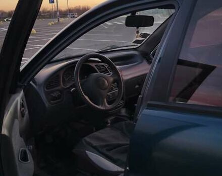 Зеленый Дэу Ланос, объемом двигателя 1.39 л и пробегом 198 тыс. км за 1999 $, фото 8 на Automoto.ua